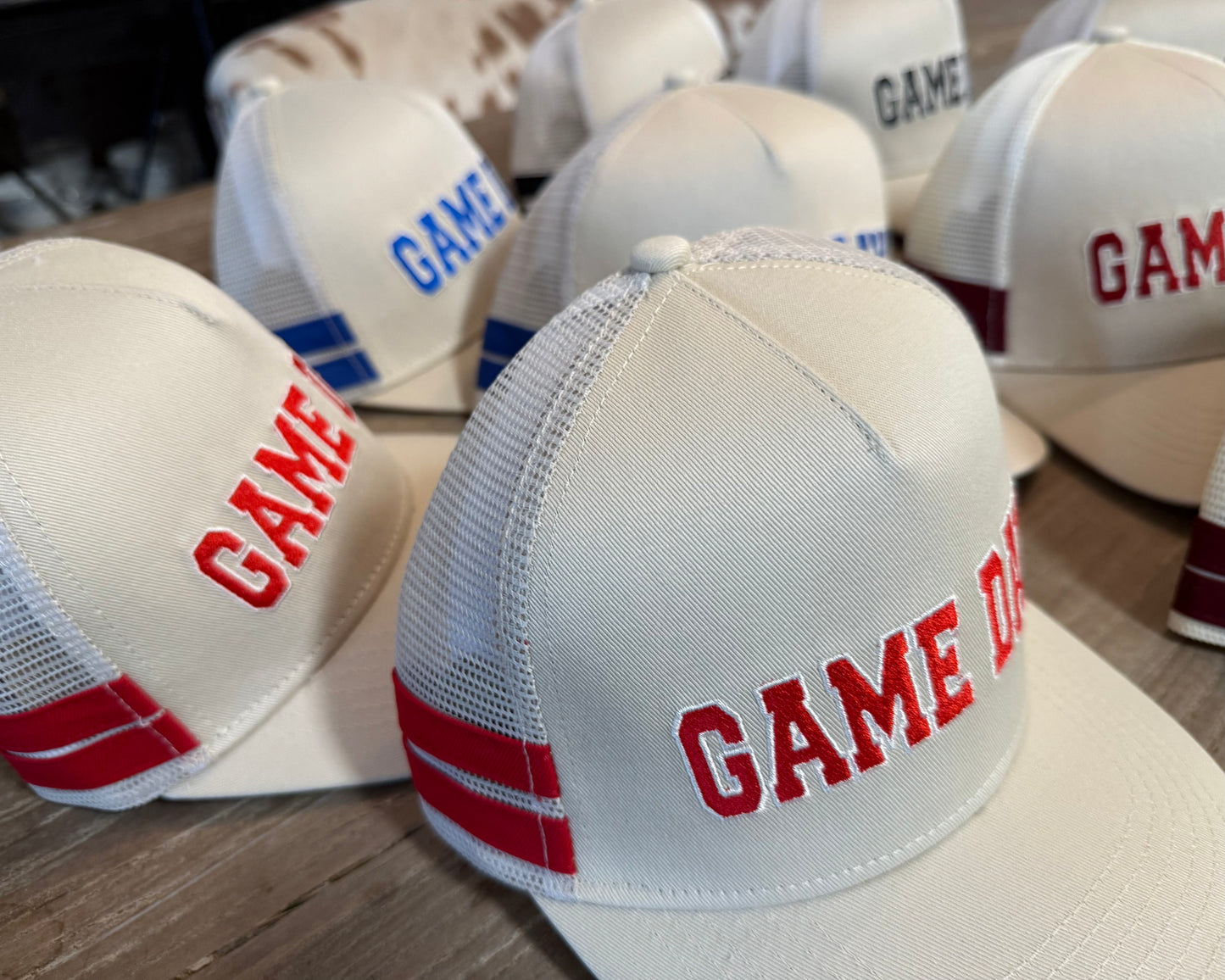 Embroidered Game
Day Double Stripe
Trucker Hat